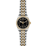 Tudor luxury watch with black dial, gold accents, and sparkling gemstone bezel for elegance and precision.