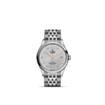 Elegant Tudor watch with rose gold accents and textured silver dial for timeless luxury.