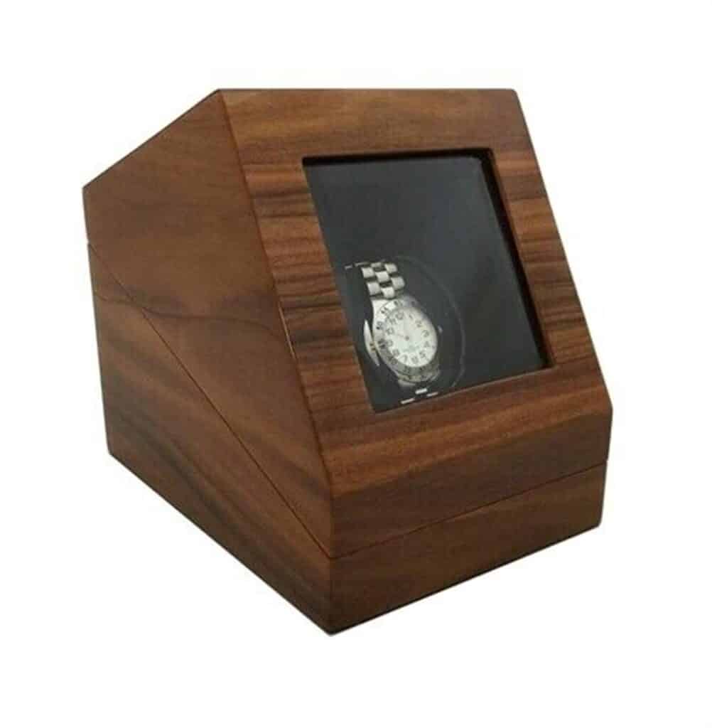 Elegant wooden watch display box with glass front, showcasing a classic timepiece beautifully.