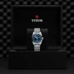 Luxurious Tudor watch in elegant box with blue dial and premium bracelet.
