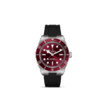 Tudor diving watch with a burgundy dial, stainless steel case, and durable rubber strap.