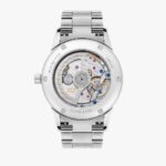 Elegant mechanical watch with transparent case back showcasing intricate German craftsmanship and vibrant movements.