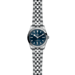 Tudor luxury watch with blue dial, stainless steel case, and elegant diamond markers.