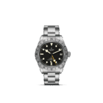Tudor GMT watch with black dial, luminous markers, stainless steel bezel, and date function.