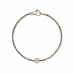 Elegant gold bracelet with sparkling charm, perfect for any occasion and handcrafted with precision.