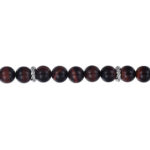 Elegant wooden and metallic bead necklace showcasing natural textures and polished finishes.