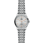 Elegant Tudor watch in polished silver with textured dial and rose gold accents.