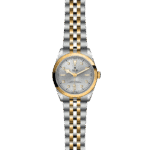 Elegant Tudor watch with silver and gold design, showcasing luxury and precision craftsmanship.