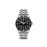 Tudor watch with stainless steel case, black dial, and sporty unidirectional bezel.