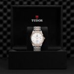 Tudor luxury watch displayed in elegant packaging, showcasing craftsmanship and timeless design.