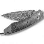 Elegant Damascus steel folding knife with carbon fiber handle, showcasing exquisite craftsmanship and design.