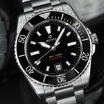 Sophisticated diving watch with robust design, luminous dial, and durable metal bracelet.