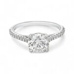 Elegant engagement ring with a brilliant diamond in a classic white gold band.