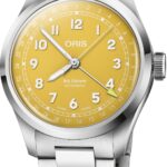 Bright yellow dial Swiss automatic watch with bold numerals and stainless steel bracelet for style.