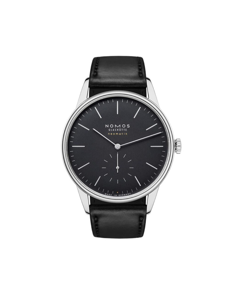 NOMOS Glashütte elegant black watch with stainless steel case and leather strap, showcasing minimalist design.