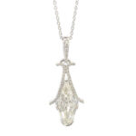 Elegant drop pendant necklace featuring a sparkling central gem and luxurious metallic accents.