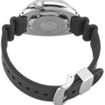 Close-up of a stylish stainless steel wristwatch with a black rubber strap.