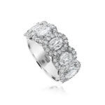 Elegant ring with oval gemstones and halo design, perfect for luxury jewelry lovers.