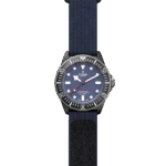 Tudor diving watch features blue dial, stainless steel case, and durable fabric strap for adventurers.