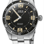 Modern stainless steel dive watch with a black dial, luminous markers, and unidirectional bezel.