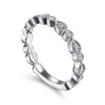 Elegant Gabriel & Co. white gold ring with teardrop and circular diamond accents.