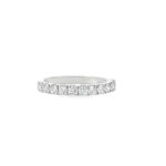 Elegant diamond band ring in white metal, perfect for engagements and timeless fashion.