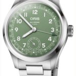 Stylish Oris Big Crown watch with bold green dial and stainless steel bracelet.