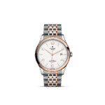 Elegant Tudor watch in stainless steel and rose gold with a classic design and refined details.