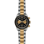 Luxurious Tudor chronograph watch in stainless steel and gold with a black dial.