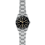 Tudor dive watch with black dial, luminous markers, and stainless steel case for elegance and durability.