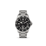 Tudor diving watch with stainless steel case, rubberized bezel, and luminous dial for underwater use.