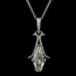 Exquisite diamond pendant necklace with intricate sparkle, perfect for luxurious formal occasions.