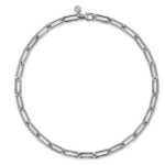Elegant silver chain necklace with unique elongated links and round accents for modern style.