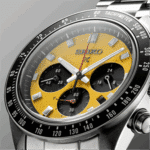 Vibrant yellow Seiko watch with chronograph sub-dials, stainless steel case, and tachymetric scale.