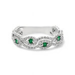Elegant sterling silver ring with green gemstones and sparkling accents, perfect for any occasion.