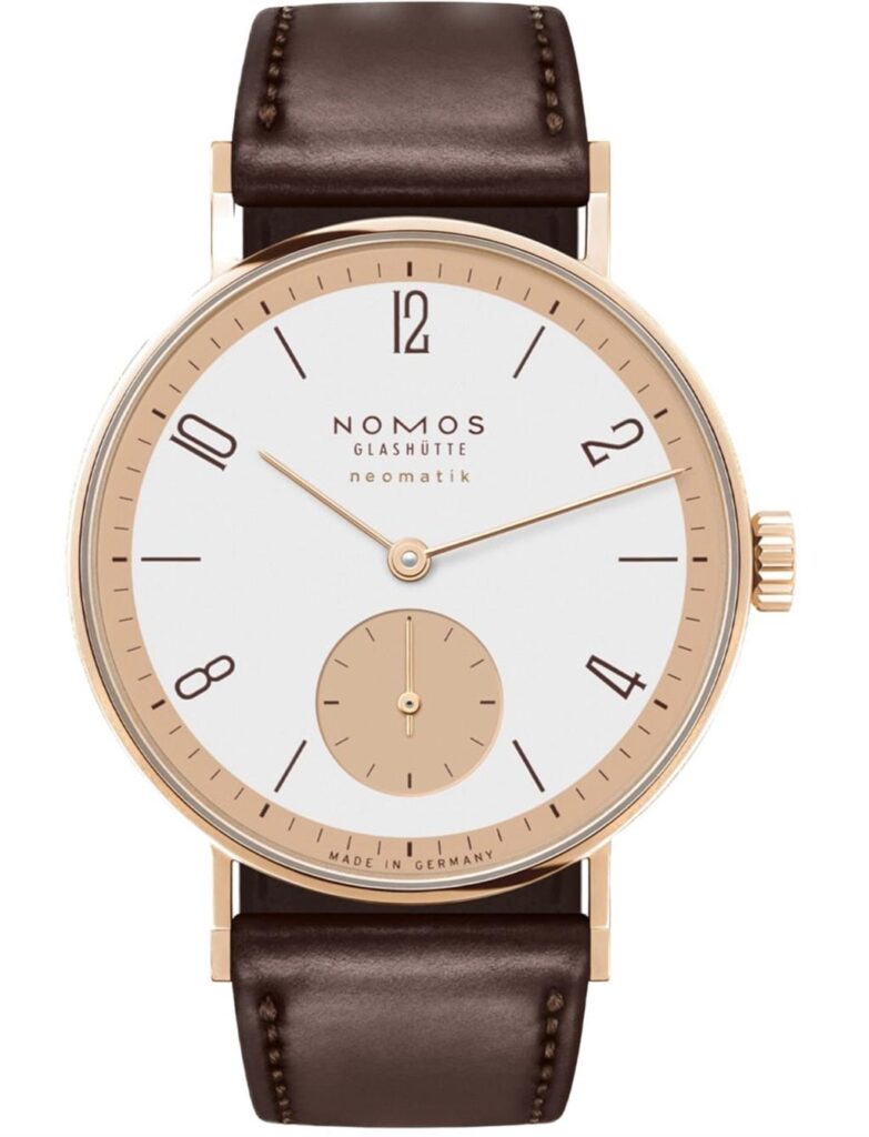 Sophisticated NOMOS Glashütte neomatik wristwatch in rose gold with minimalist design and brown leather strap.