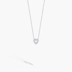 Elegant silver heart necklace with sparkling gemstones, perfect for any occasion.