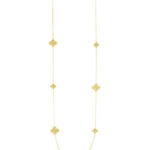 Elegant gold necklace with intricate motifs, perfect for any casual or formal occasion.