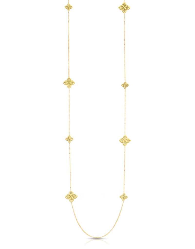 Elegant gold necklace with intricate motifs, perfect for any casual or formal occasion.