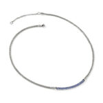 Elegant silver necklace with braided chain and deep blue gemstone accents for sophisticated style.