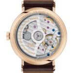 Limited edition NOMOS Glashütte watch in rose gold, showcasing intricate mechanical movement and craftsmanship.