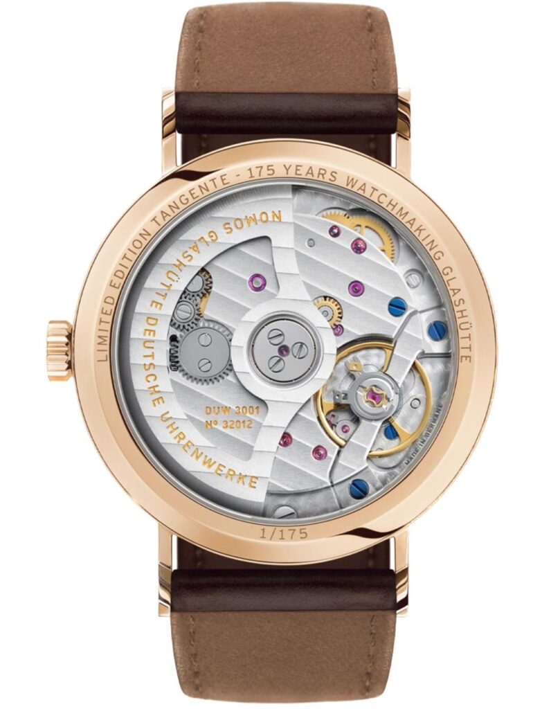 Limited edition NOMOS Glashütte watch in rose gold, showcasing intricate mechanical movement and craftsmanship.