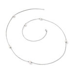 Elegant minimalist silver necklace with lustrous pearls, perfect for any occasion.