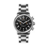 Shinola stainless steel watch with black dial, luminous hands, and modern design for stylish timekeeping.