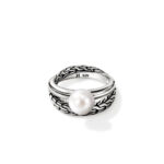 Elegant sterling silver ring with a textured band and a lustrous pearl centerpiece.