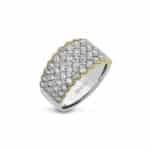 Elegant silver and gold ring with sparkling stones, perfect for special occasions or gifting.