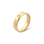 Elegant gold ring on a white background, symbolizing simplicity and timeless style.