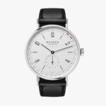 Elegant NOMOS Glashütte automatic watch with minimalist design and leather strap.