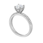 Elegant engagement ring featuring a large diamond and pavé accents in white gold.