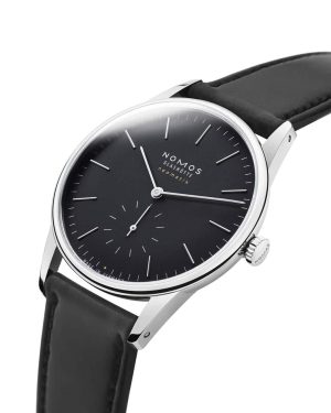 Elegant Nomos Glashütte watch with black dial and leather strap, showcasing minimalist luxury design.